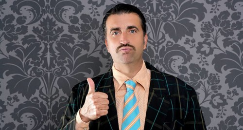 Nerd businessman gesturing ok positive with hand over retro wallpaper