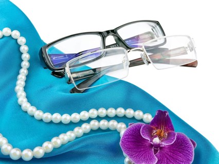 Pair of modern stylish eyeglasses against white background