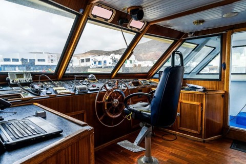 The ferry cockpit will all necessary instruments to travel at boat approaching La Graciosa island,
