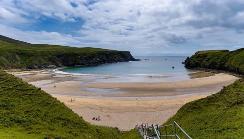 A view of the beautiful Silver Strand and horseshoe bay at Malin Beg on the Wild Atlantic Way of