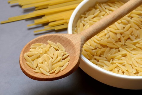 Semi di Orzo, Italian pasta in the form of barley grains, and spaghetti, pasta from Italy