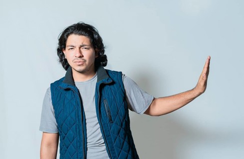 Displeased young man rejecting with palms hands isolated. Upset person making rejection gesture