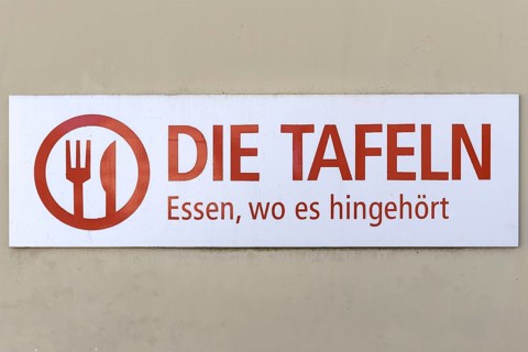 Sign of a food bank, food distribution for the needy, on a house wall, Franconia, Bavaria, Germany,