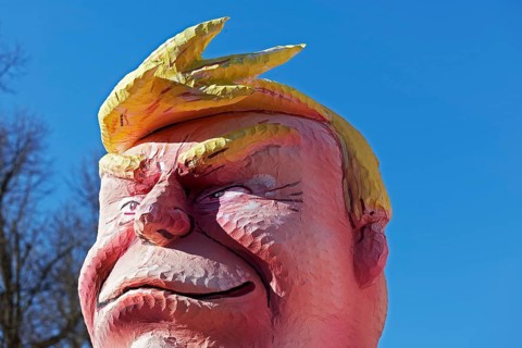 US President Donald Trump, head with yellow quiff, papier-mâché figure, Jacques Tilly theme float,