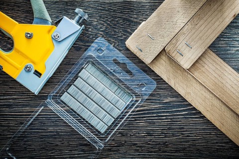 Building stapler gun staples wooden planks