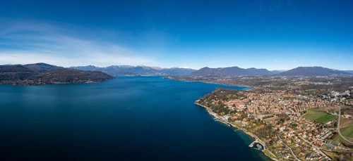 Drone landscape panorama of Lake Maggiore in the Italian Lake District and the village of Ispra