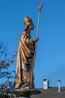 Bronze bishop figure in Seeg, Allgäu, Bavaria, Germany, Europe