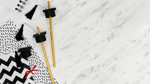 Flat lay festive graduation arrangement marble background