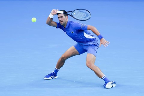 MELBOURNE, AUSTRALIA, JANUARY 11: Novak Djokovic of Serbia plays Stefanos Tsitsipas of Greece