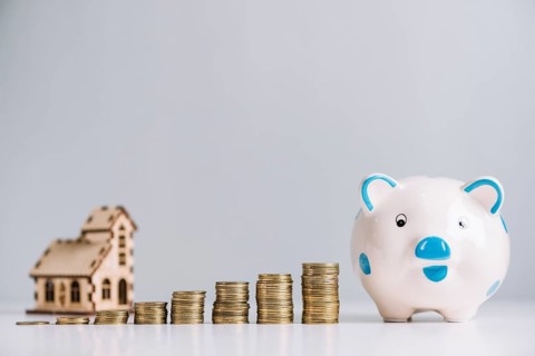 Stack increasing coins piggybank front house model