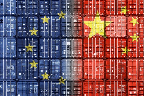 Container with Chinese and European flag, symbolic photo of economic relations and punitive