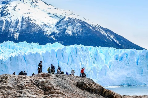 Tourists exploring the stunning Perito Moreno Glacier