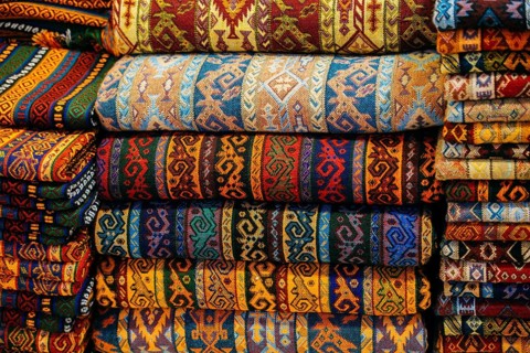 Traditional Turkish rug textile with patterns in bazaar