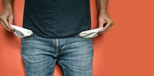 Man has empty trouser pockets