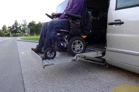 Disabled Men on Wheelchair using Accessible Vehicle with Lift
