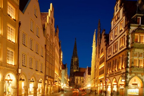 Lamberti Church and town houses at Prinzipalmarkt by night, Münster, North Rhine-Westphalia,