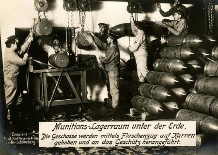 Underground ammunition storage room. The shells are lifted onto carts using a pulley and brought to