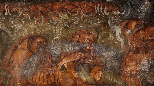 A mural shows grotesque, demonic creatures with grim faces in a menacing scene, Easter 2025, Church