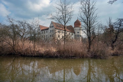 Moated castle, originally a manor house, converted into a Renaissance castle between 1612 and 1618,