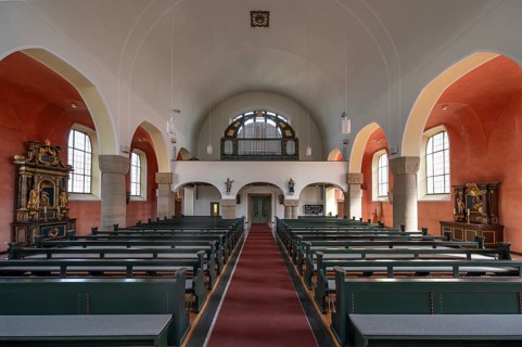 Interior with organ loft of St Stephen's Church, Art Nouveau building designed with neo-Romanesque