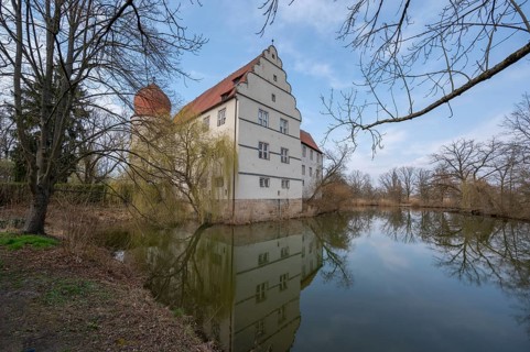 Moated castle, originally a manor house, converted into a Renaissance castle between 1612 and 1618,