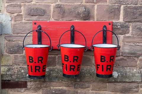 Fire bucket, railway station, Winchcombe, The Cotswolds, England, Great Britain