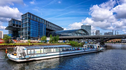 Berlin passenger ship at the main railway station and the Humboldt harbour bridge, Germany, Europe