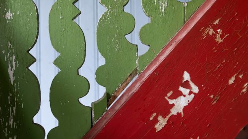 Old staircase detail painted red and green