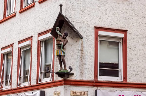 Moor in the Mohrenstraße. Figure on a building façade in Schwäbisch Hall. The term Mohr for a