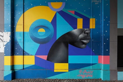 Realistic face with VR glasses made of geometric shapes, 3D portrait, mural by street artist SKIO,