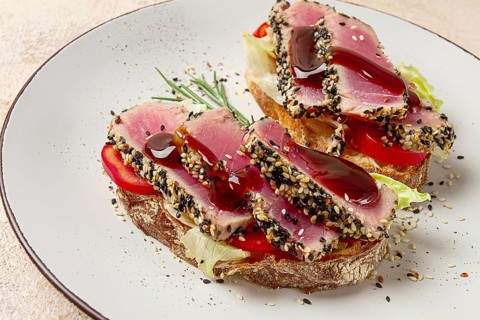 Sandwiches with fried tuna fillet, sesame, breakfast, top view, homemade