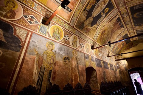 Historic church art with frescoes on the walls and vaulted ceiling, atmospheric lighting, Thari
