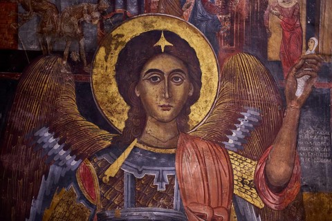 Fresco of an angel with golden halo and wings in Orthodox style, Easter 2025, Church of the