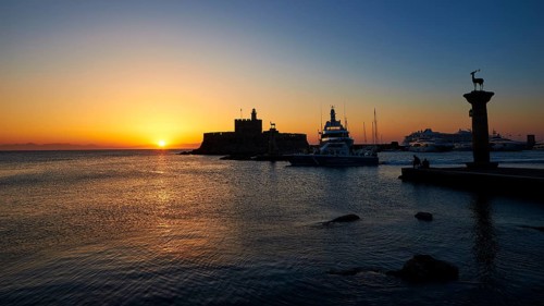 Harbour with boats and fortress, sunrise, dawn, Fort of Saint Nikolaos, Mandraki Harbour, Rhodes