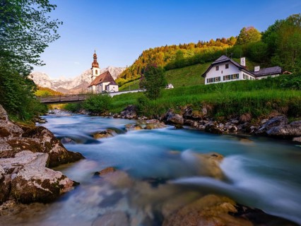Parish church of St Sebastian on the Ramsauer Ache in the morning, Reiteralpe at the back, Ramsau,