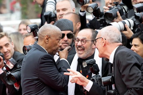 Cannes, France - 19.5.2024: Denzel Washington jokes with photographers during the - Highest 2