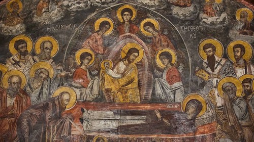 Fresco showing Christ with saints, many icons with golden decoration in an ornate frame, Easter