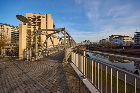 Modern architecture, footbridge, metal railing, river Saar, blue sky, cirrostratus clouds, evening