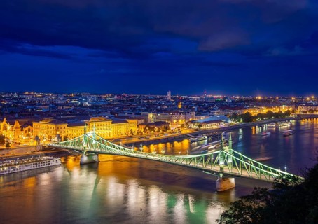 Evening panorama of Budapest with the Danube and the Liberty Bridge in the foreground