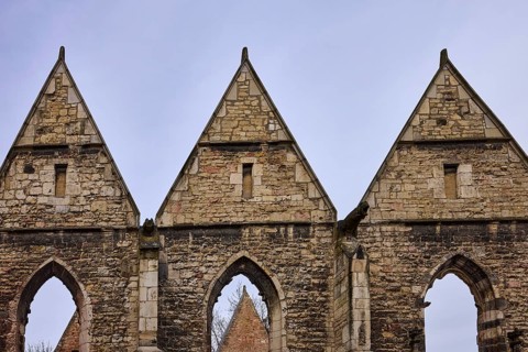 Ruins of the Aegidienkirche, memorial for victims of war and violence, diffuse light, milky blue