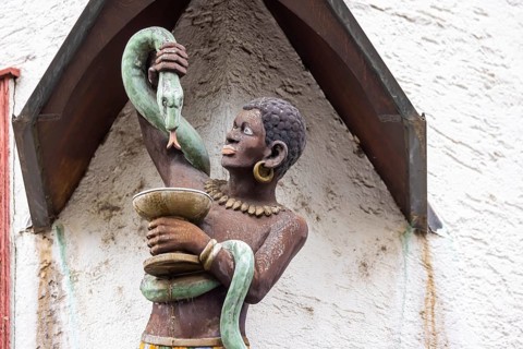 Moor in the Mohrenstraße. Figure on a building façade in Schwäbisch Hall. The term Mohr for a