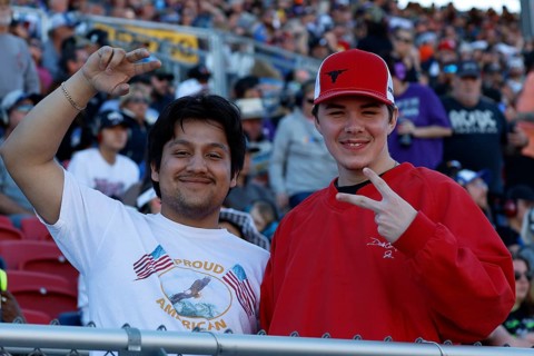 Fans cheer and watch the NASCAR Cup Series Championship Race at Phoenix Raceway in Avondale, AZ,