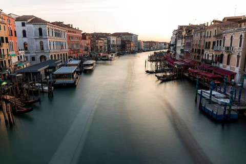 Evening light at sunset, view over the Grand Canal, from the Rialto Bridge, long exposure, Venice,