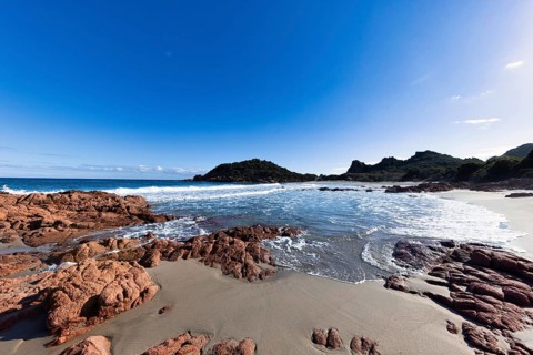 Bay with beautiful beach and sea in the sunshine, Spiaggia di Su Sirboni, Ogliastra, Sardinia,
