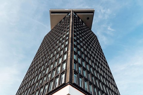 Amsterdam, Netherlands, May 6, 2022: The A'DAM Tower. Office skyscraper in Amsterdam. View against