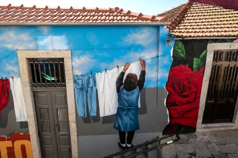 Illusion painting on a house facade in the historic centre, city of Porto, Portugal, Europe