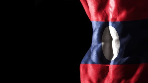Laos flag on abs muscles national sport workout, bodybuilding concept, black background