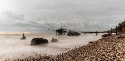 Trabocco Punto Le Morge on a rainy day under a cloudy sky long exposure on the Abruzzo Coast