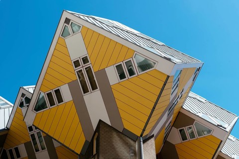 Rotterdam, Netherlands, May 8, 2022: Yellow cubic houses in Rotterdam. The Cubic Houses were
