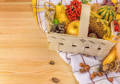 Lovely autumn decoration with all sorts of pumpkins, corn, grain, sunflower and forest fruits, set